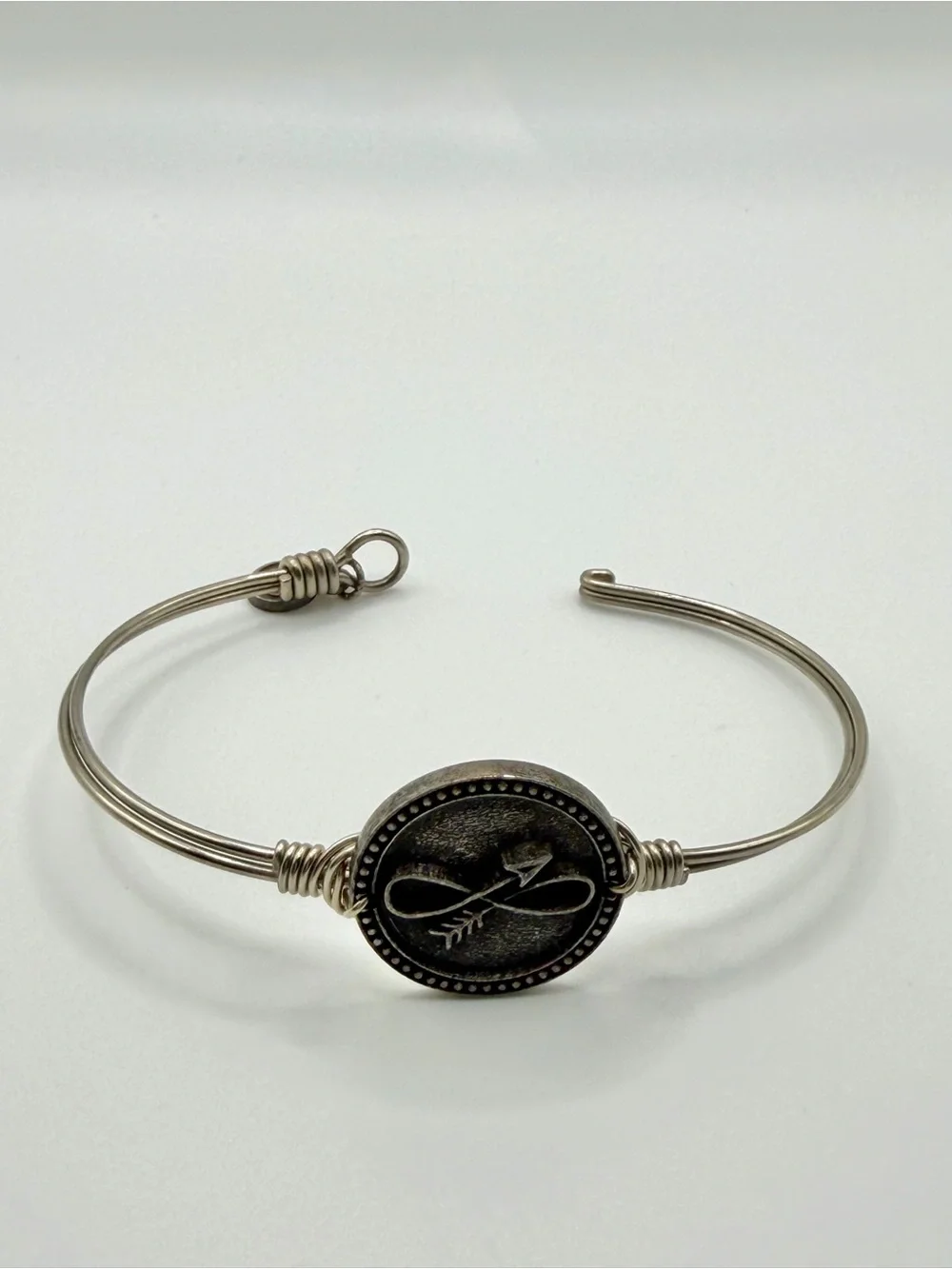 Luca + Danni Infinity Arrow Silver Tone Wire Bangle Bracelet + Pouch